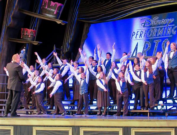 Chino High Chorale signing on Disneyland stage Chino High Chorale signing on Disneyland stage